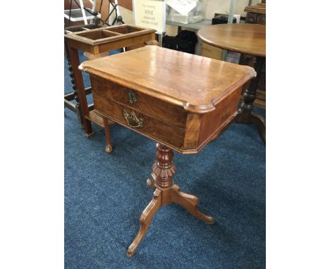 A 19th century walnut lift up top sewing table on single column tripod base. IMPORTANT: Online viewing and bidding only. Coll