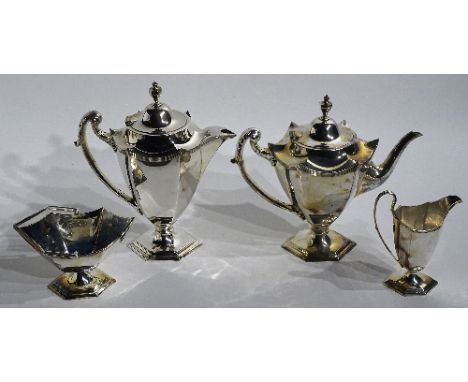 A stylized Walker & Hall plated teaset, comprising teapot, water pot, milk jug and sugar bowl, the urn finials to lid above s