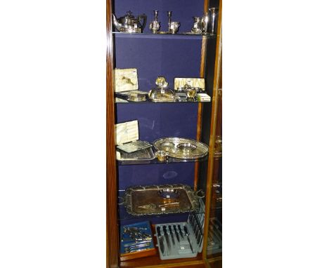 A quantity of plated ware, to include foliate embossed tray, salvers, teapot, candlesticks, posy vases, butter knives, pin tr