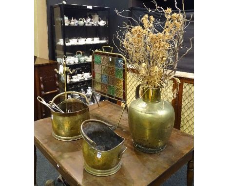 A small mixed lot of brass and metalwares, comprising of brass and leaded coloured glass firescreen, two coal helmets, compan