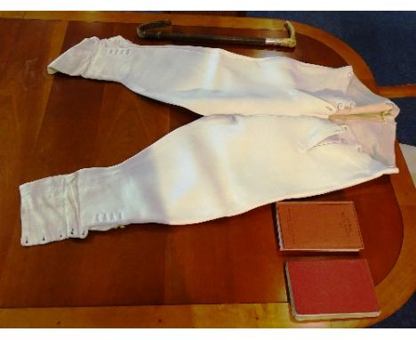 A small group of horse riding accessories, to include hunting crop with horn handle, pair of vintage suede buckskin riding br