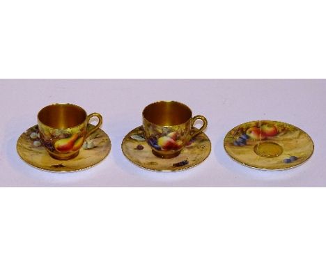 A Royal Worcester fruit pattern coffee can and saucer, painted by R Rushton (cup) and William Hale (saucer), decorated with t