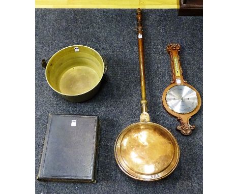 A copper bed warming pan, together with a brass jelly pan, an antiquarian leather bound bible and a modern barometer by Cleve
