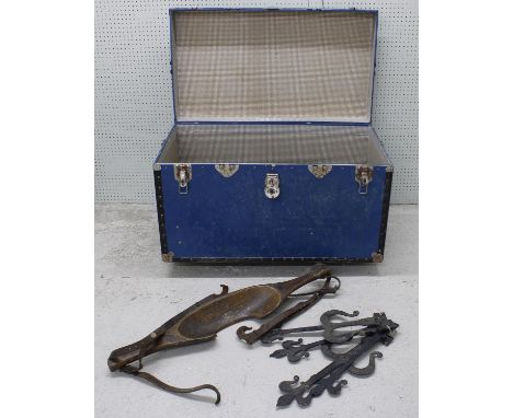 Large vintage trunk containing assorted woodworking tools including hand drills, planes, vices etc.; also a pair of metal gat
