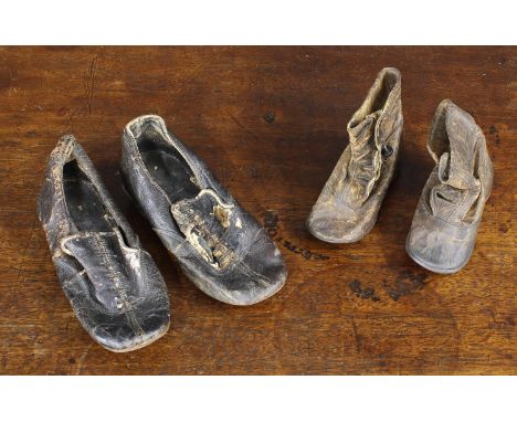Two pairs of vintage children's leather shoes; together with two blonde hair curls and a New York Evening Post business card 