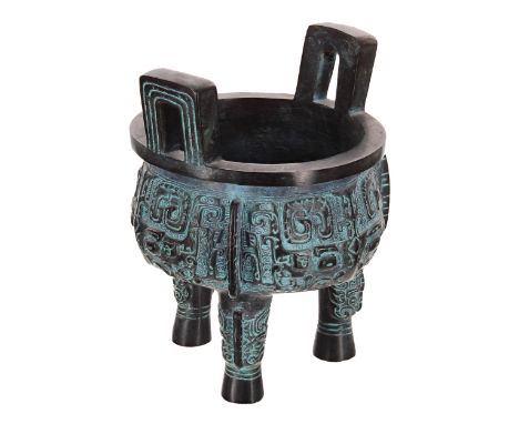 Chinese twin-handled cast bronze tripod censor, with carved archaic style decoration, the interior with inscribed calligraphy