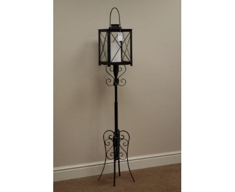 Wrought metal candle stand with lantern, H136cm   Condition Report   Click here for further images, condition, auction times 