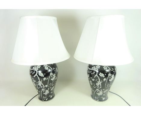 Pair of Chinese style vases with Cherry Blossom decoration on a black ground H35cm including fitting (2) (This item is PAT te