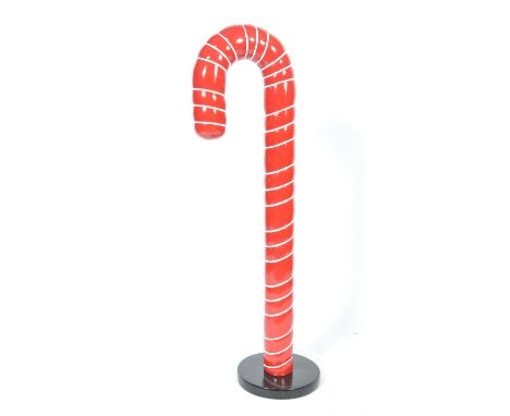 A wonderful 20th century advertising / exhibition / prop display Christmas Candy Cane statue. Red and white traditional candy