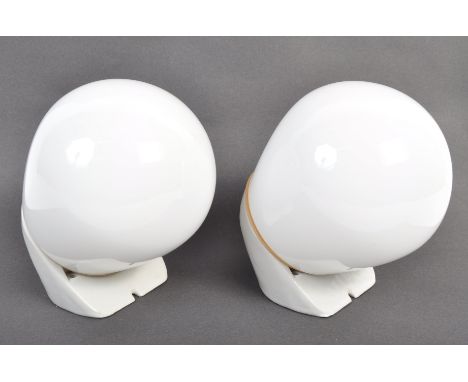 A pair of 20th century retro vintage industrial glass wall light sconces - comprising of a ceramic wall mountable base with m