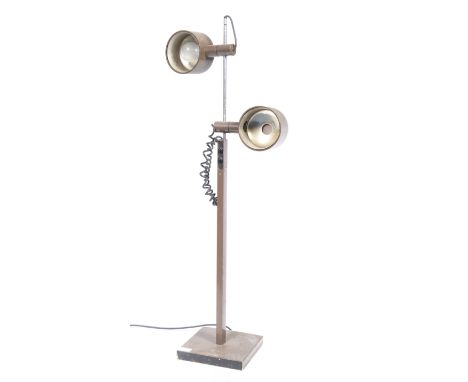 Ronald Homes - Conelight Ltd - A 1970's retro vintage twin floor standing spotlight lamp having adjustable chocolate brown cy