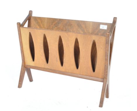 A stunning 1960's Danish retro vintage teak and walnut magazine rack comprising of teak ' X ' frame legs with a large panel b