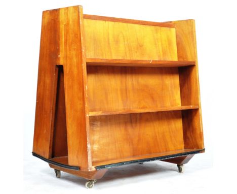 A mid 20th Century retro vintage teak wood library double sided book trough / trolley having an ' A ' frame constructed form 