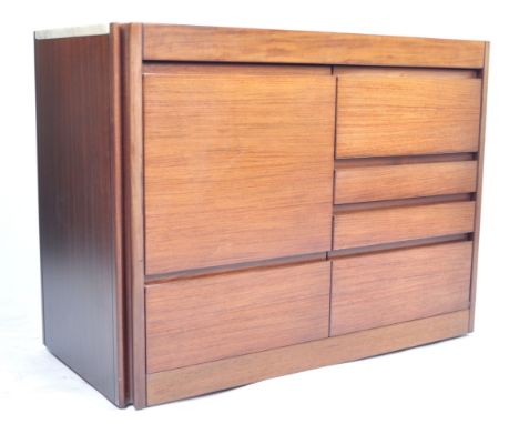A stunning 1970's designer Danish retro vintage hostess serving / bar cart trolley having an arrangement of deep and shallow 