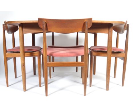 Kofod Larsen - G Plan / E. Gomme - A 1960's retro vintage teak wood dining suite comprising of a shaped rectangular extending