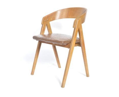A stunning mid 20th Century retro vintage oak carver armchair having a shaped backrest raised on ' A ' frame legs with padded