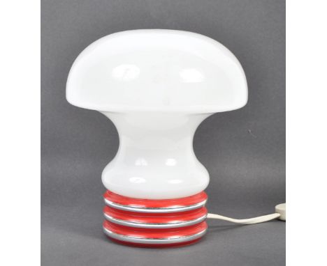 A mid 20th Century retro vintage glass table lamp in the form of a stylised light bulb having a milk glass shade and plastic 