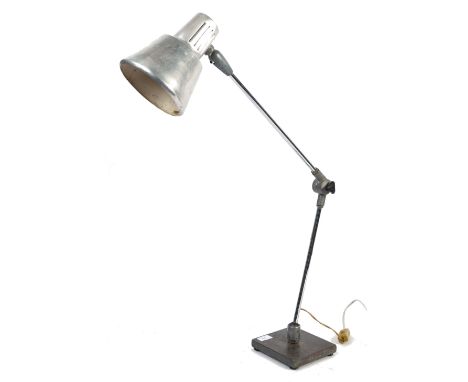 An original 1960's retro vintage industrial factory work desk lamp having a brushed metal pendant shade raised on an articula