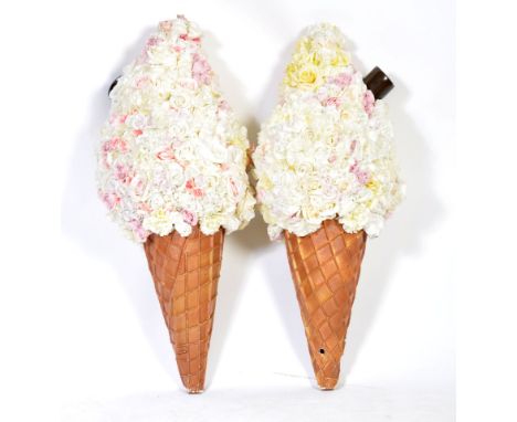 A pair of 20th century contemporary florists shop display / events props each in the form of an ice cream - the tops being ma