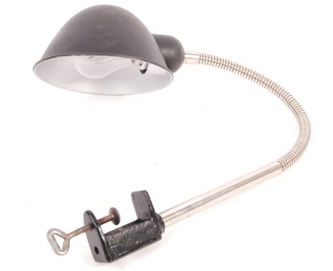 A 20th Century retro vintage industrial gooseneck lamp having a later domed black shade and a clamp base. Measures 70cm when 
