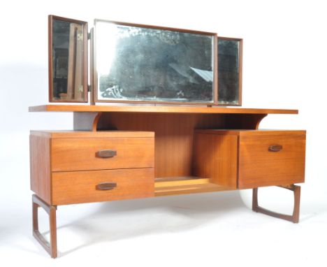 R. Bennett - G Plan - Quadrille - A 1960's retro vintage teak wood mirror backed dressing table having a floating top and two