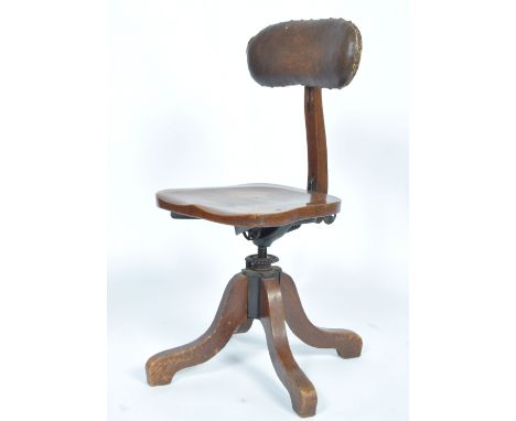 An early 20th Century 1920's Art Deco antique vintage industrial oak mechanics / architects swivel chair.The chair having an 