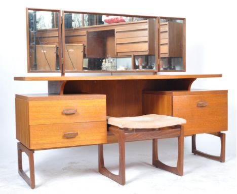 R. Bennett - G Plan - Quadrille - A 1960's retro vintage teak wood mirror backed dressing table having a floating top and two