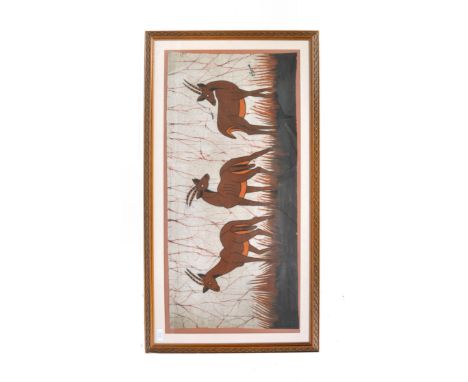 A 20th Century African Tribal dyed fabric print depicting three antelope, mid graze but alert with decoration of grass and vi