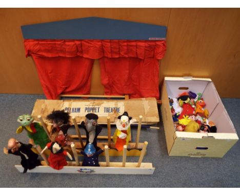 A Pelham Puppets lightweight puppet theatre, two hand puppet stands and a quantity of hand puppets to include Punch and Judy 