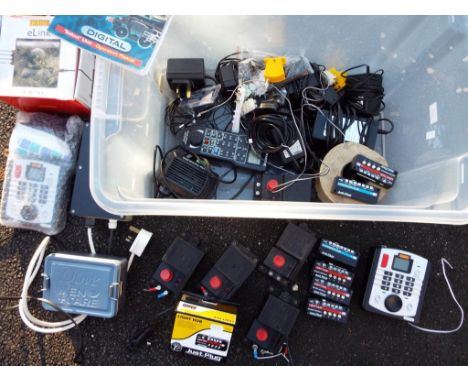 Model railways - a box of modern transformers, digital and other power controllers, switches, light hubs, street lights, cabl