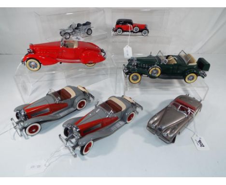 Diecast - seven diecast model motor vehicles to include five by The Danbury Mint comprising two 1935 Duesenberg SSJ, 1934 Pac