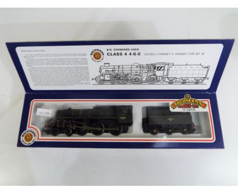 Model Railways - An OO gauge Bachmann model steam locomotive, 4-6-0 op no 75029 with tender, in green with British Railways l