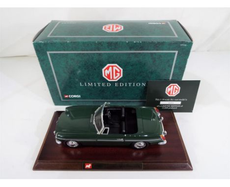 Corgi - a 1:18 scale diecast model MGB with wooden plinth issued in a limited edition with certificate of authenticity, mint 