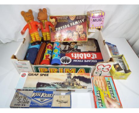 A mixed box of vintage toys to include a flying scale series Keil Kraft M.E.109, an Airfix Series 4 model kit Graf Spee, a Me