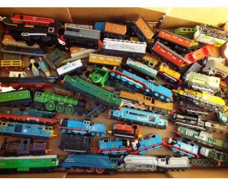 Thomas the Tank Engine and Friends - a large collection of unboxed items of rolling stock to include approximately 24 locomot