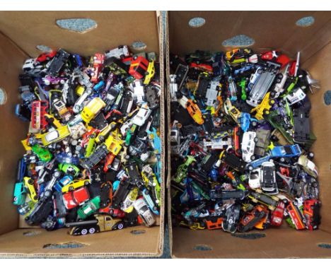 Diecast - two boxes containing a large quantity of unboxed diecast model motor vehicles to include Hot Wheels, Maisto, Matchb