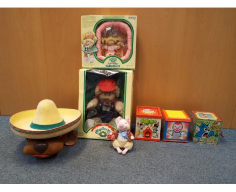 A good lot to include a Cabbage Patch Kids doll in original window box with certificate, a Cabbage Patch Kids pin-ups Mini in