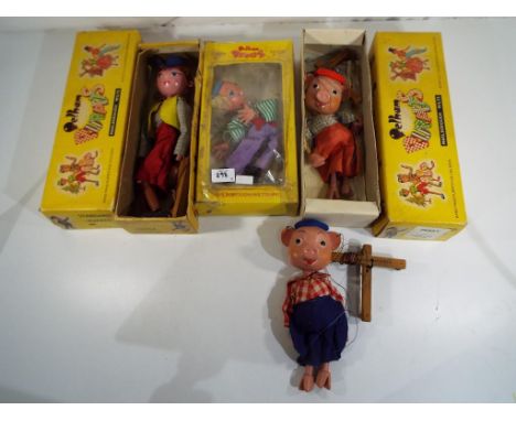 Pelham Puppets - a Pelham puppet SS Cowgirl in original box, a JC2 Boy from the Pelham Puppet Junior Range in original window