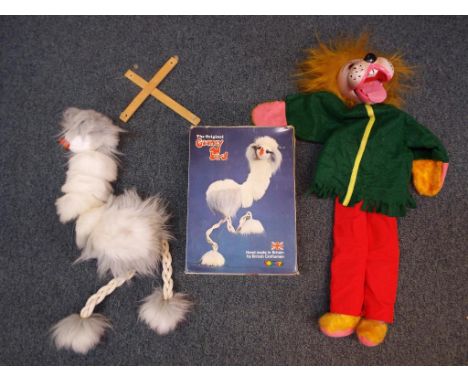 A Pelham ventriloquial puppet depicting Fido the Lion (unboxed) and a boxed Toyway Original Gooney Bird puppet, Sylvia in ori