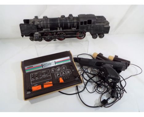 A Grandstand 3600 mk3 video sports game and console, boxed and a scratch built model 4-6-4 steam locomotive  [2] - - This lot