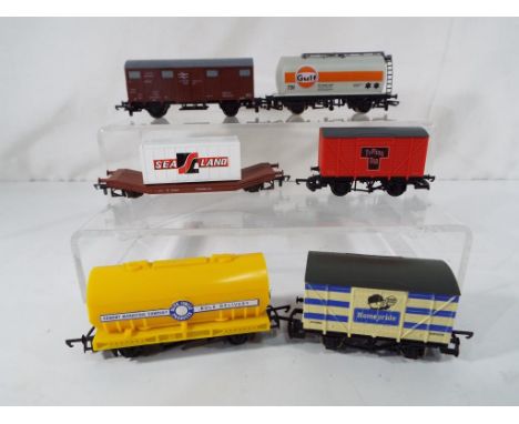 Model Railways - six rolling stock freight wagons to include Lima Typhoo Tea, Lima Homepride 12 tons BHP 3228, Sealand 904466