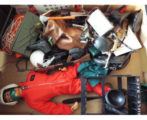 Action Man - an Action Man figure and a good collection of clothing, kit and other accessories  - This lot MUST be paid for a