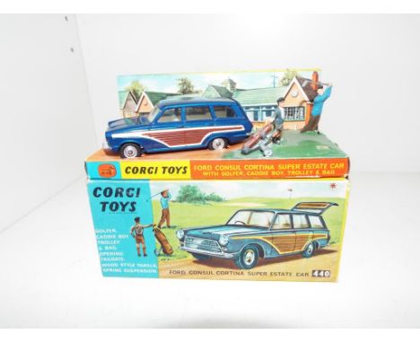 Corgi Toys - a diecast scale model of a Ford Consul Cortina Super Estate car # 440 metallic dark blue with brown side panels,