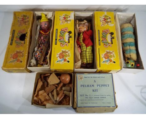 Pelham Puppets - a good lot to include three boxed Pelham puppets comprising a caterpillar, Rupert the Bear and a clown and a