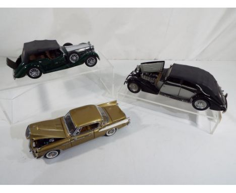 Franklin Mint and Danbury Mint - three good 1:24 scale diecast precision models comprising 1938 Alvis 4.3 litre, 1939 Maybach