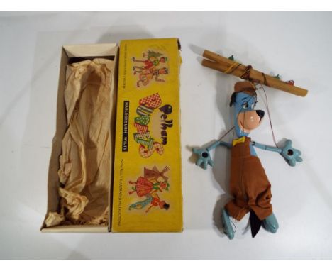 Pelham Puppets - a good quality Pelham puppet in original yellow box depicting the Hanna-Barbera character Huckleberry Hound.