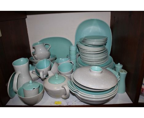SECTION 3.  An extensive Poole Pottery dinner service, with external mottled mushroom glaze and turquoise internal glaze, inc