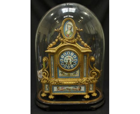 A 19th century French ormolu and porcelain mantel clock, mounted with Sevres style panels painted with cherubs, birds and flo