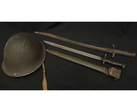 An 1860 pattern sword bayonet, together with a 1917 US bayonet and an Italian tin helmet. (3)