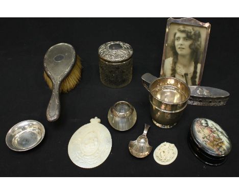 A small collection of silver items including a Birmingham silver christening mug, a cut glass dressing table jar and oval pot